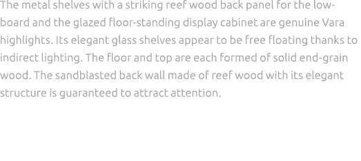 The metal shelves with a striking reef wood back panel for the lowboard and the glazed floor standing display cabinet...